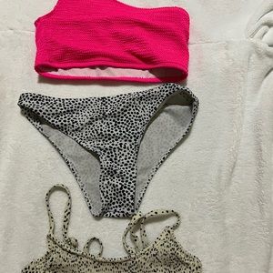 2 swimsuit tops, one swimsuit bottom
